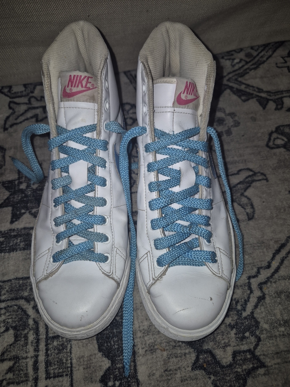 Nike White High-Top Sneakers with Blue Laces